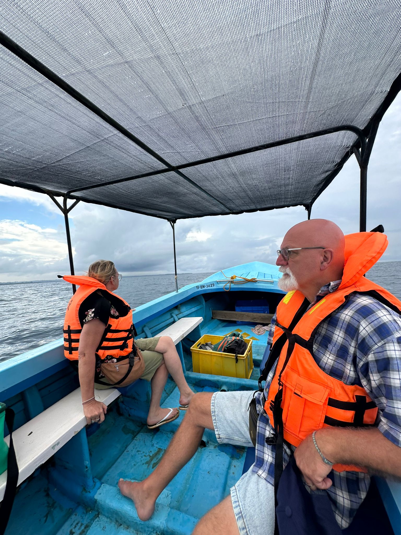 Voyagers on Shaded Safari Boat Cruising Mirissa Waters